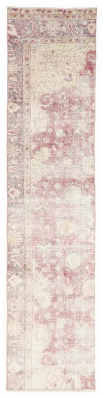 Full top view of the 2'2" x 9'5" rose and ivory floral Anatolian runner rug on a white background.