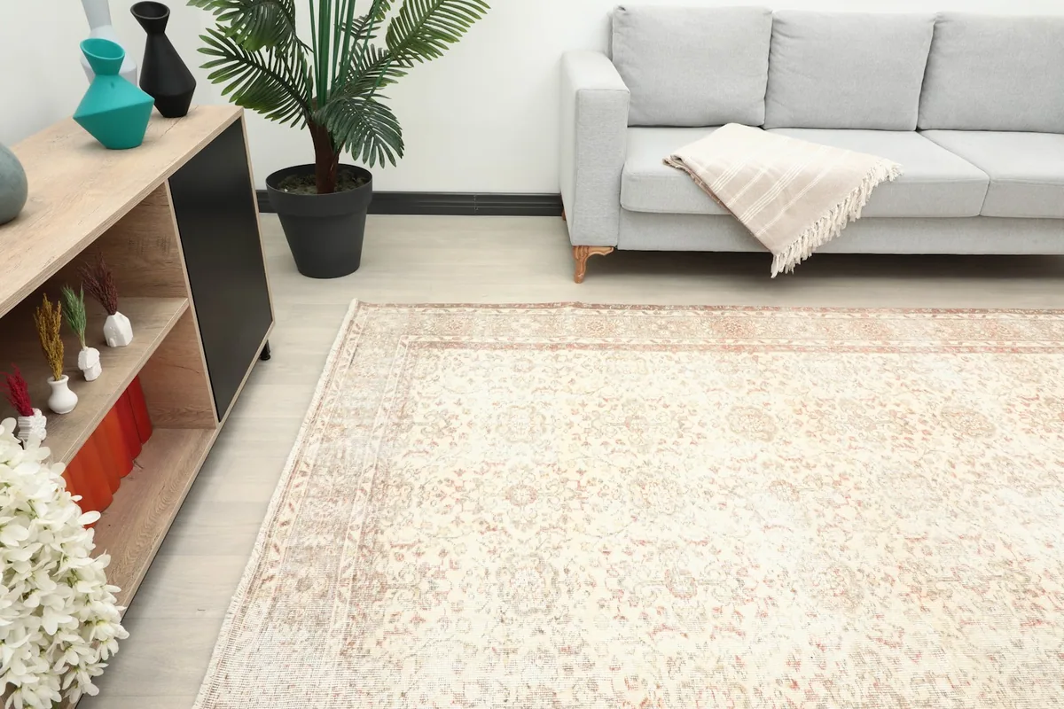Angle view of the rug complementing a modern living space with a sofa