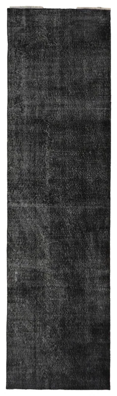 Full overhead view of the black distressed vintage Anatolian runner rug
