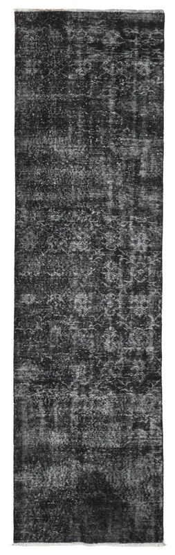 Full top view of the black and gray geometric vintage runner on a white background.
