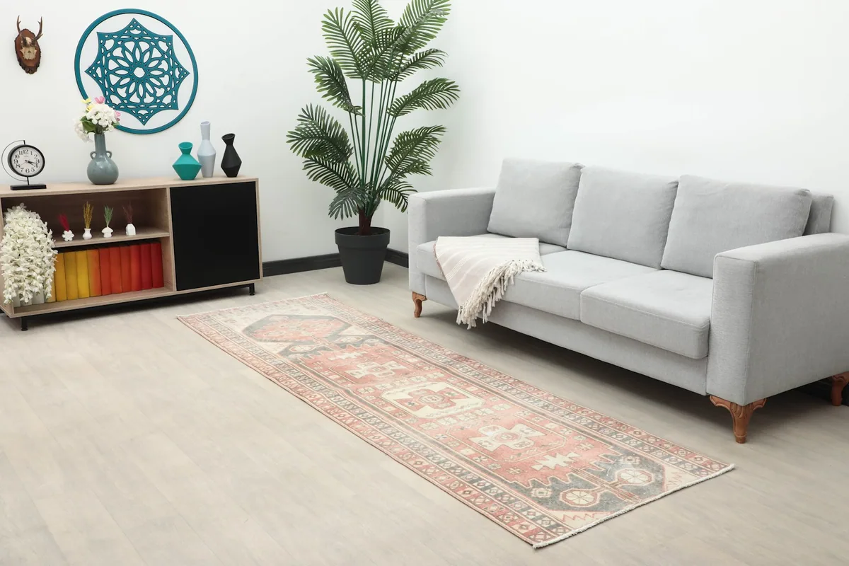 Long view of the Anatolian runner rug in a room with modern furniture, highlighting its placement.
