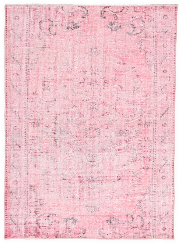 Full overhead view of the rose vintage Anatolian rug with charcoal patterns on a white background