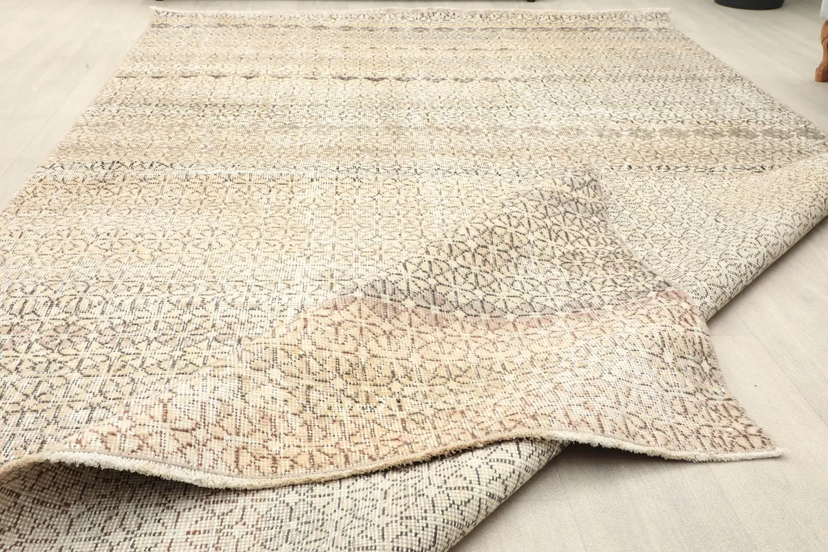 View showing the low pile texture and how the rug lays flat on the floor