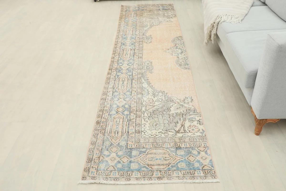 Full view of the runner rug in a room setting, showcasing its overall appearance and length