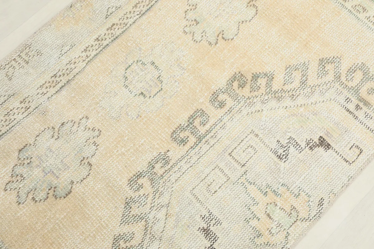 Detailed view of the central medallion-like geometric motif and surrounding patterns