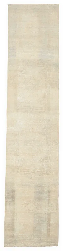 Full overhead view of the beige tonal vintage Anatolian runner rug