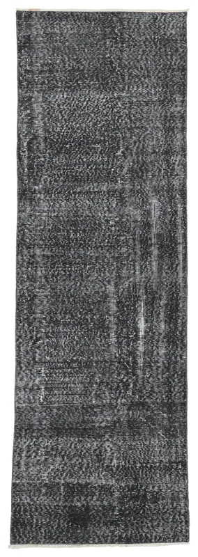 Full overhead view of the 2'9" x 8'9" charcoal and ivory vintage runner rug on a white background.