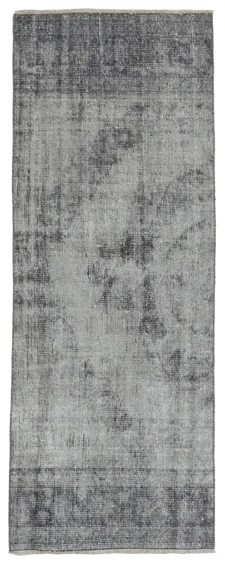 Full overhead view of the gray and charcoal distressed vintage runner rug