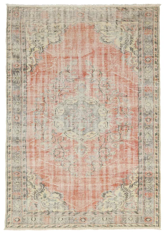 Full top view of the hand-knotted vintage Anatolian area rug with a faded rust field and gray medallion.