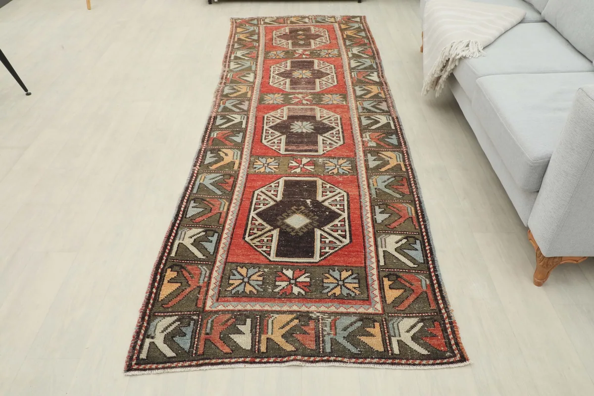 Overhead view of the entire runner rug in a room, providing a full perspective of its design and scale