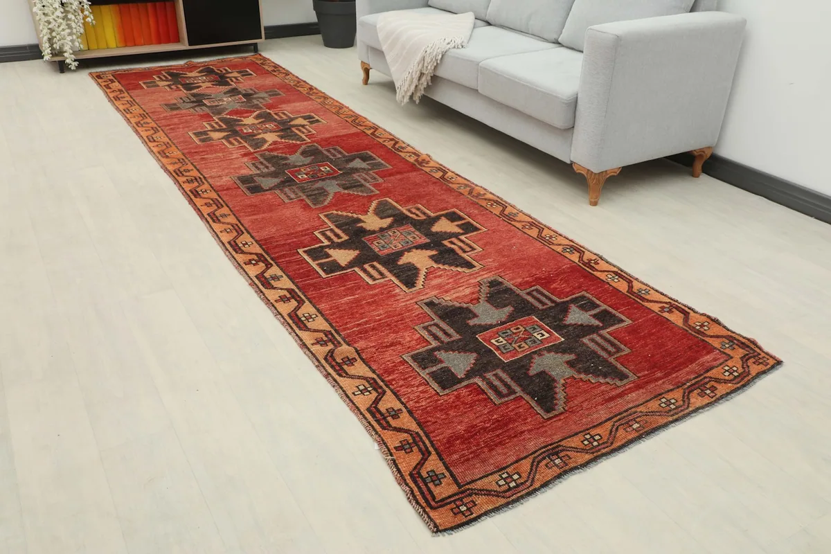 Angle view of the runner in a living space, highlighting its length and pattern