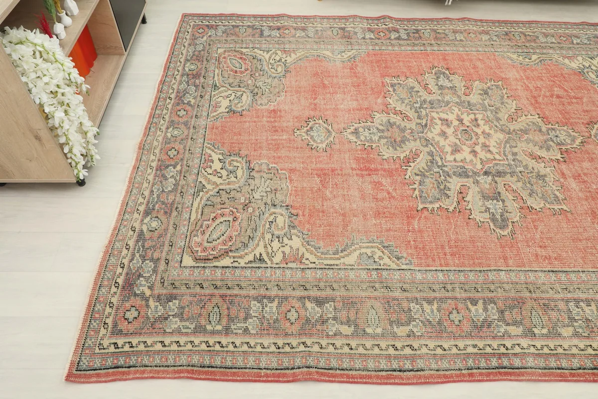 Close-up angle of the rug's central medallion and surrounding patterns