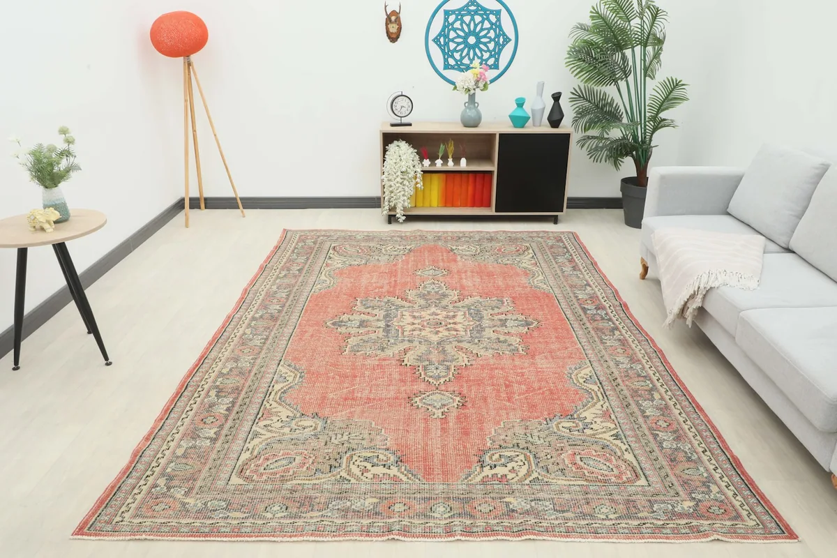 Overhead view of the vintage rust rug furnishing a contemporary living room