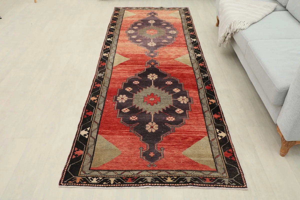 Full overhead view of the runner rug in a room, showing its complete design and scale