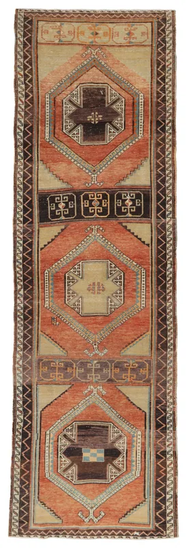 Full top view of the 3'4" x 12'4" rust and beige vintage Anatolian runner rug