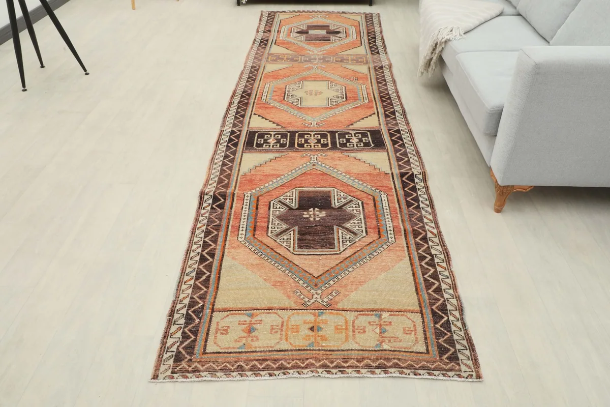 Full overhead view of the runner rug in a room, demonstrating its length and design