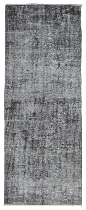 Full top view of the 2'6" x 6'6" charcoal and gray vintage Anatolian runner rug on a white background.