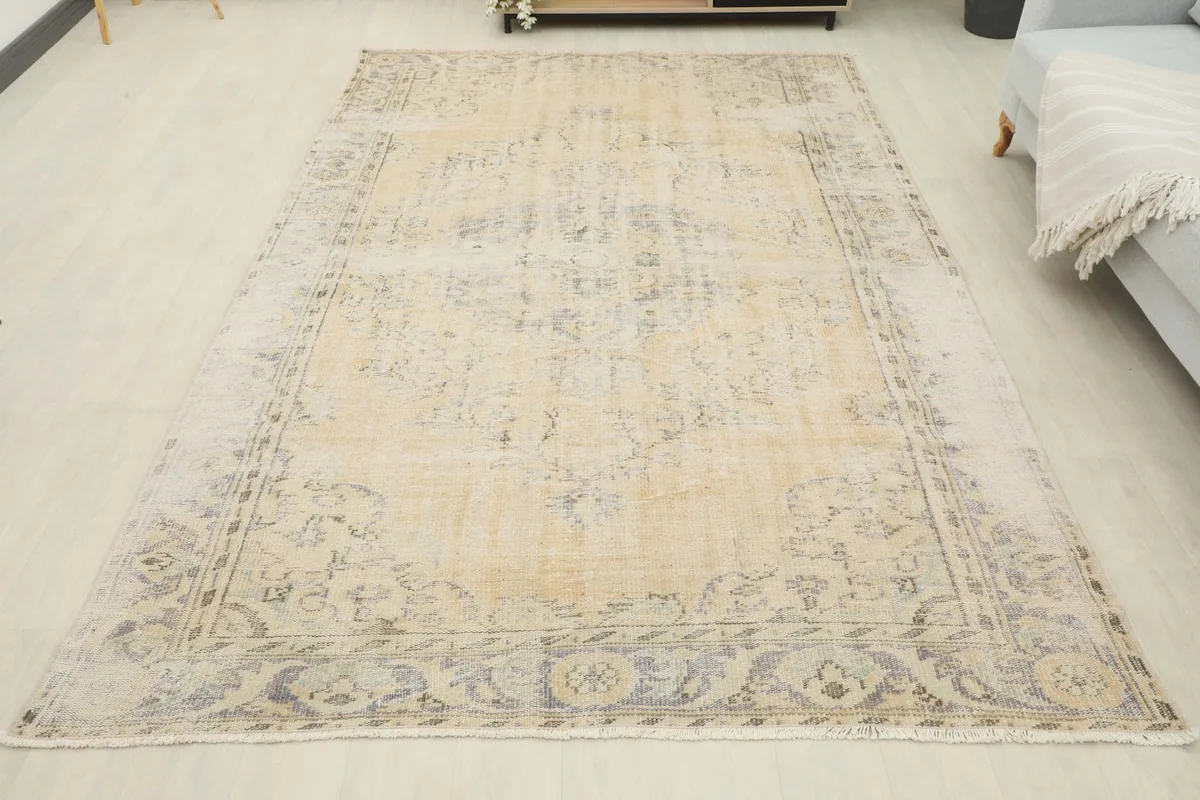 Full overhead view of the 5'1" x 9'1" vintage Anatolian rug laid out in a room setting.
