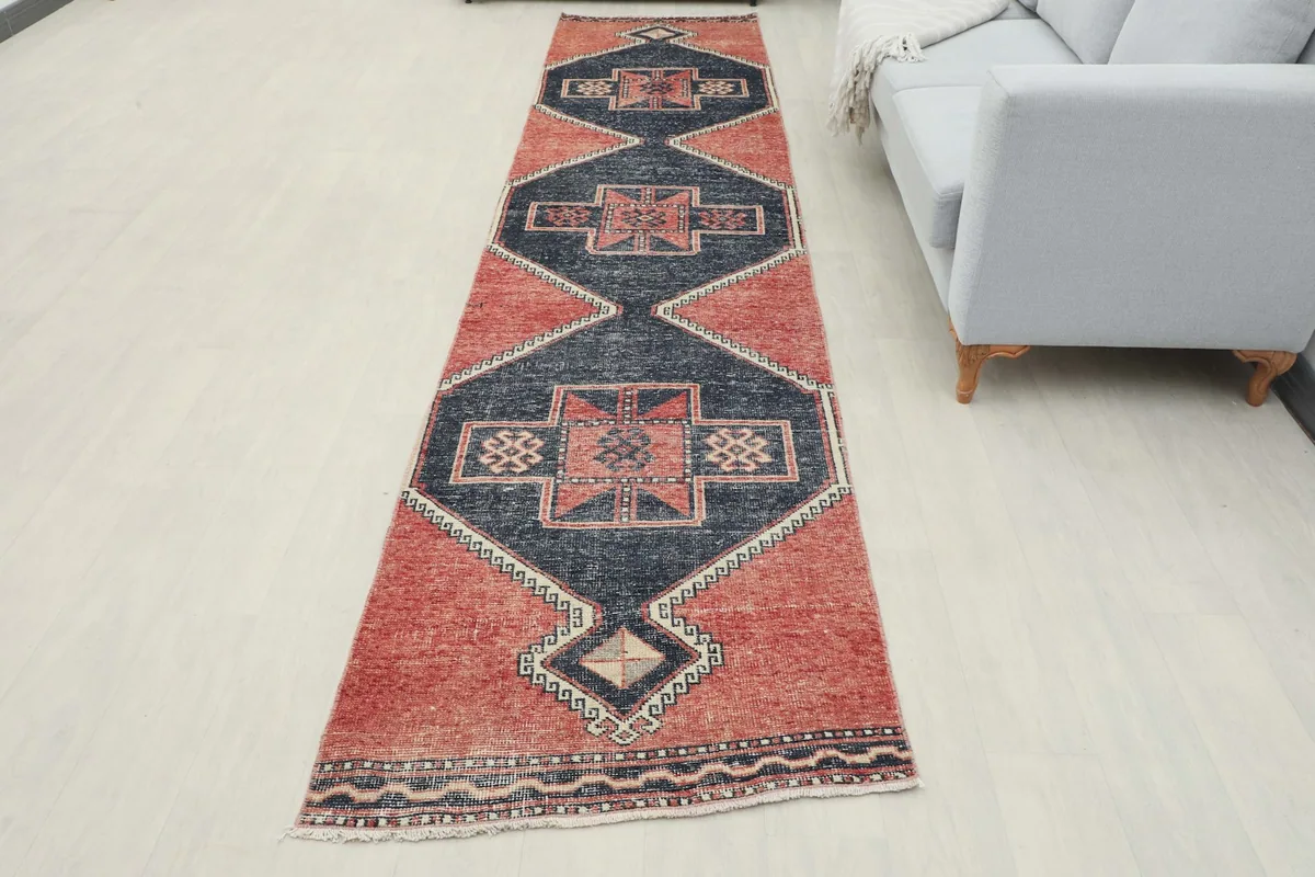 Full overhead view of the runner rug in a room, displaying its entire length and design