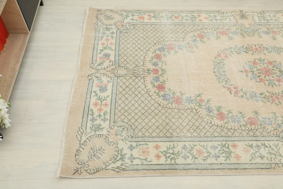 Overhead angle view capturing a section of the border and the central medallion area.