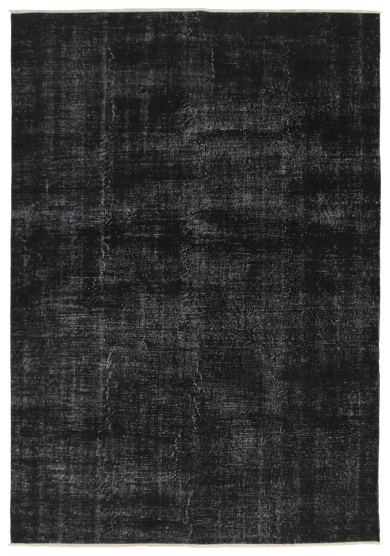 Full overhead view of the black and gray distressed vintage Anatolian rug