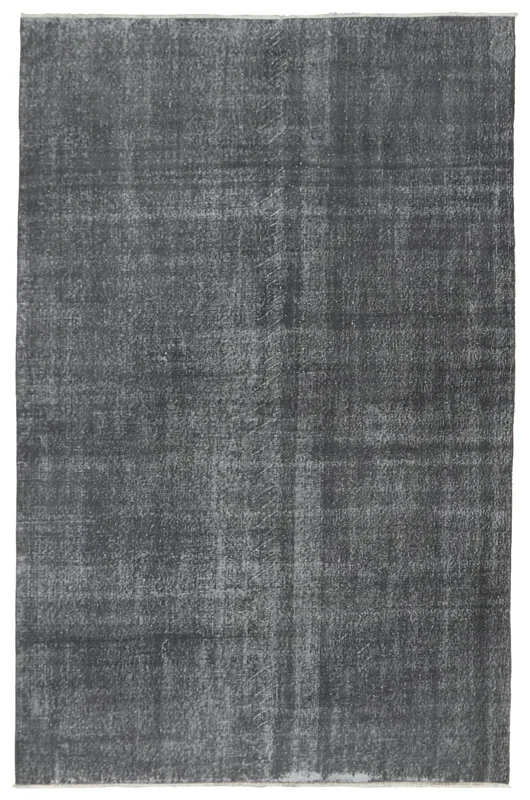 Full overhead view of the charcoal gray vintage area rug