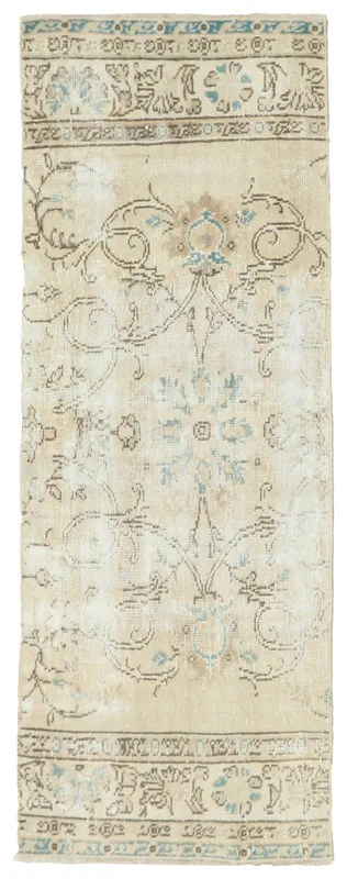 Full top view of the beige and blue Anatolian vintage runner rug on a white background.