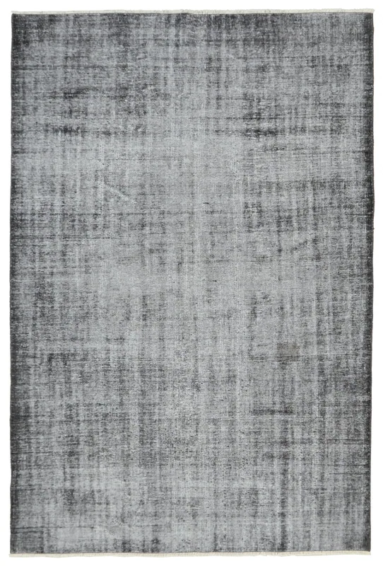 Full top view of the 6'2" x 9'1" charcoal and gray distressed vintage Anatolian rug