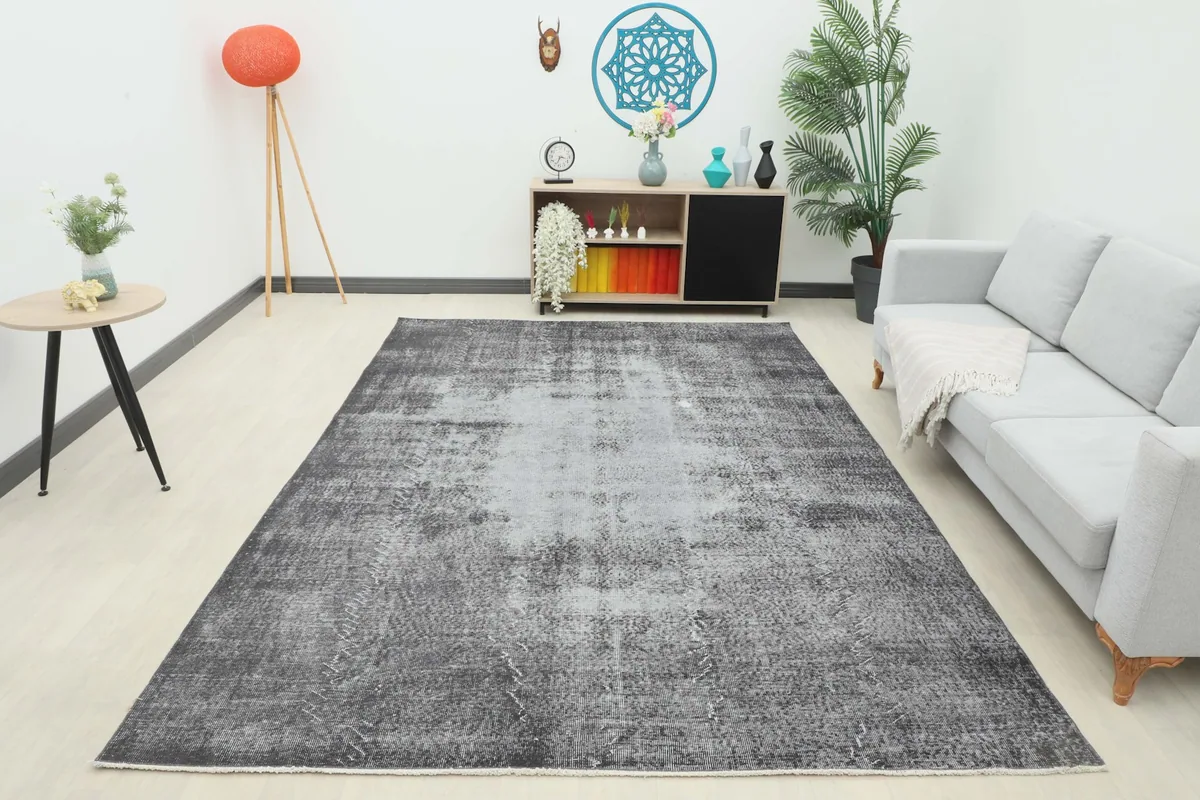 Full room view of the 7'3" x 10'5" vintage Anatolian rug, showcasing its scale and color