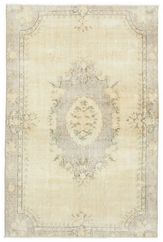 Full overhead view of the 5'7" x 8'5" ivory and gray vintage Anatolian rug