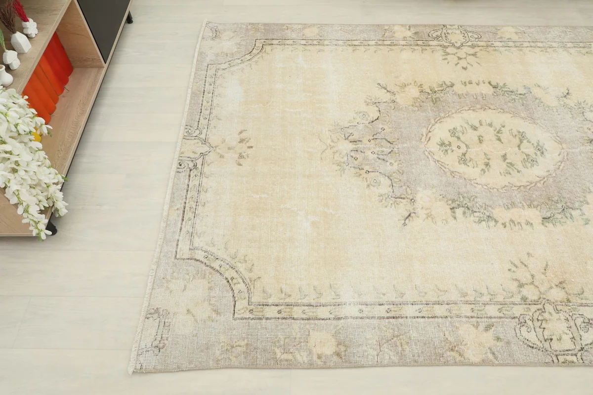 Overhead angle of the rug showing the central medallion and border patterns