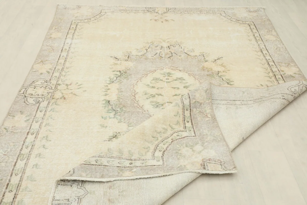 Rug corner folded to highlight the construction and reverse side