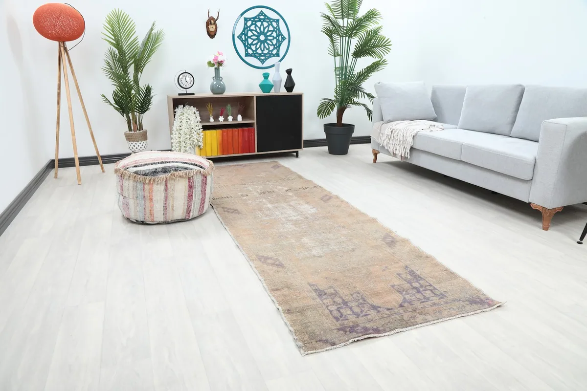 Angle view of the Anatolian runner rug in a room, showing its length and placement
