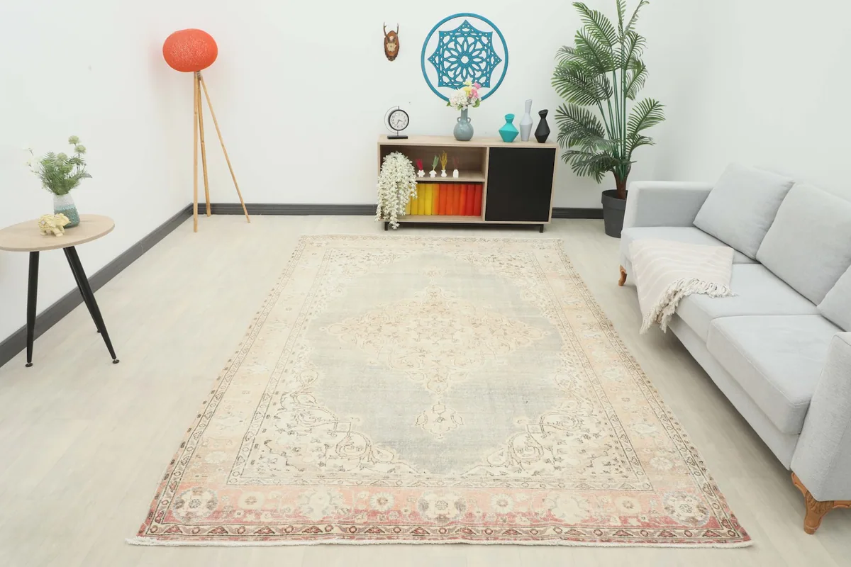 Full room view of the vintage Anatolian rug, providing context for its size and design impact