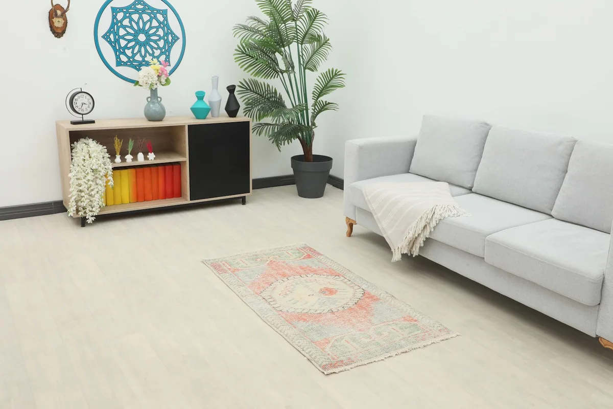 Overhead view of the rug in a room setting, showing its placement relative to furniture.