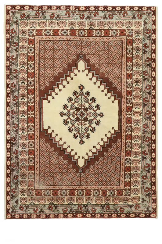 Top-down view of the 5'11" x 6'7" vintage Anatolian rug with geometric medallion.