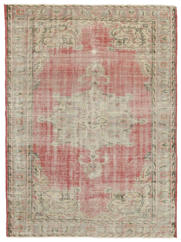 Full top view of the vintage Anatolian rose and beige medallion rug on a white background