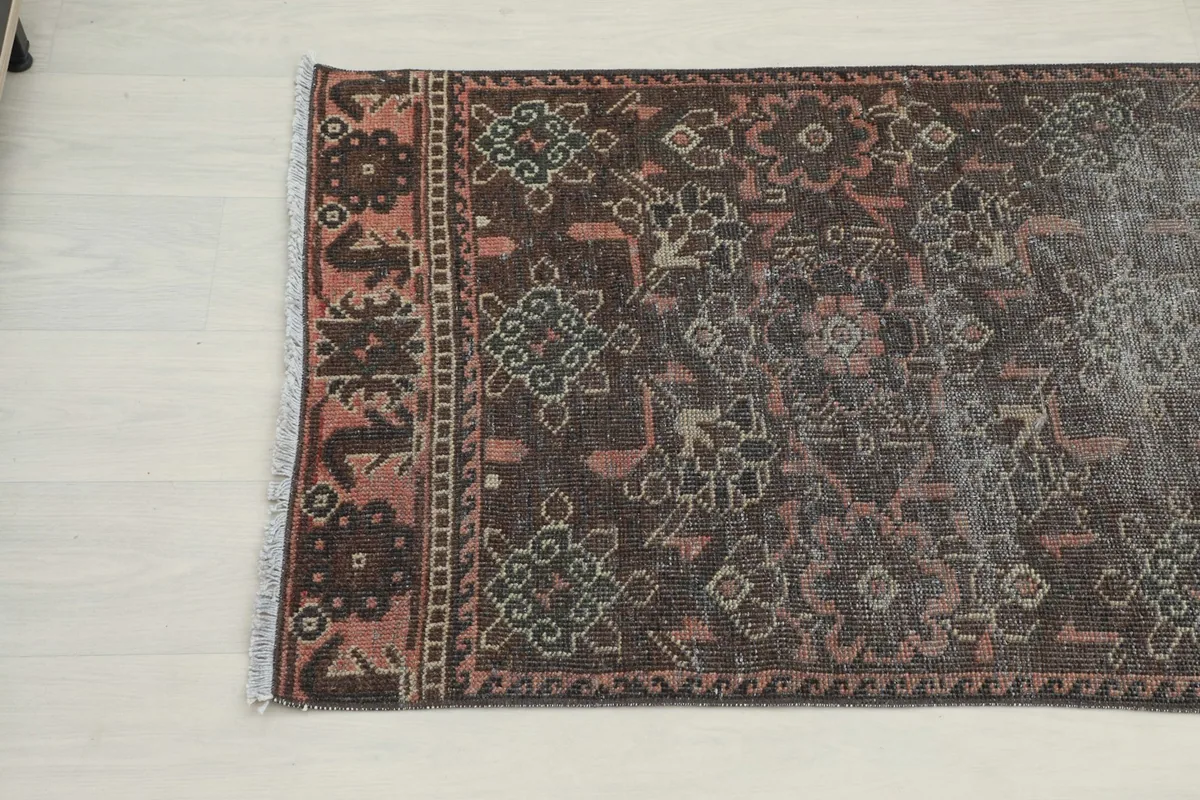 Close-up view of the other end of the runner, displaying detailed geometric motifs and colors.