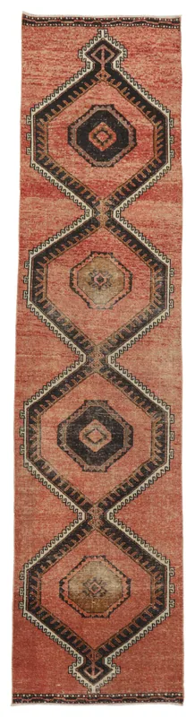 Full top view of the 2'9" x 12'3" rust geometric vintage runner rug