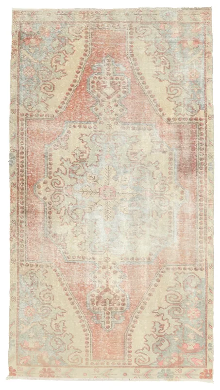 Full top view of the vintage rose and beige Anatolian area rug