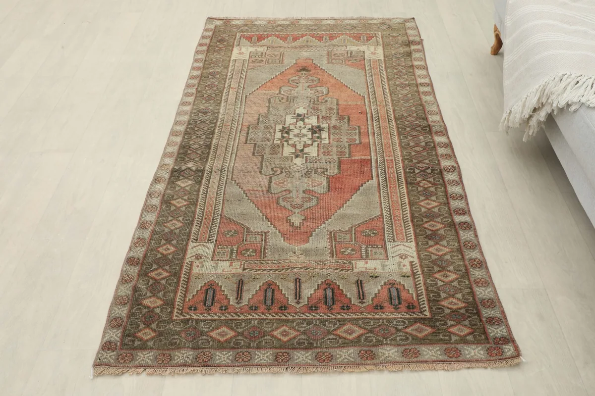 Full overhead view of the rust and gray vintage Anatolian rug in a room setting