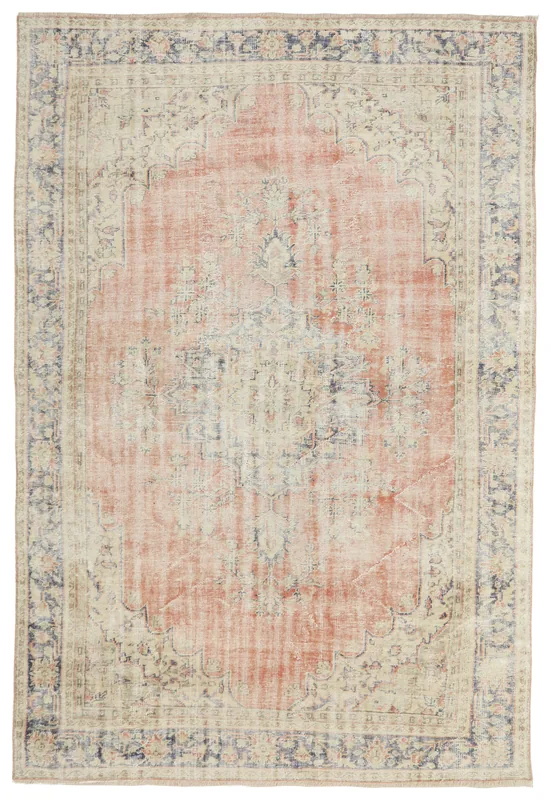 Full overhead view of the rust, navy, and ivory vintage Anatolian area rug