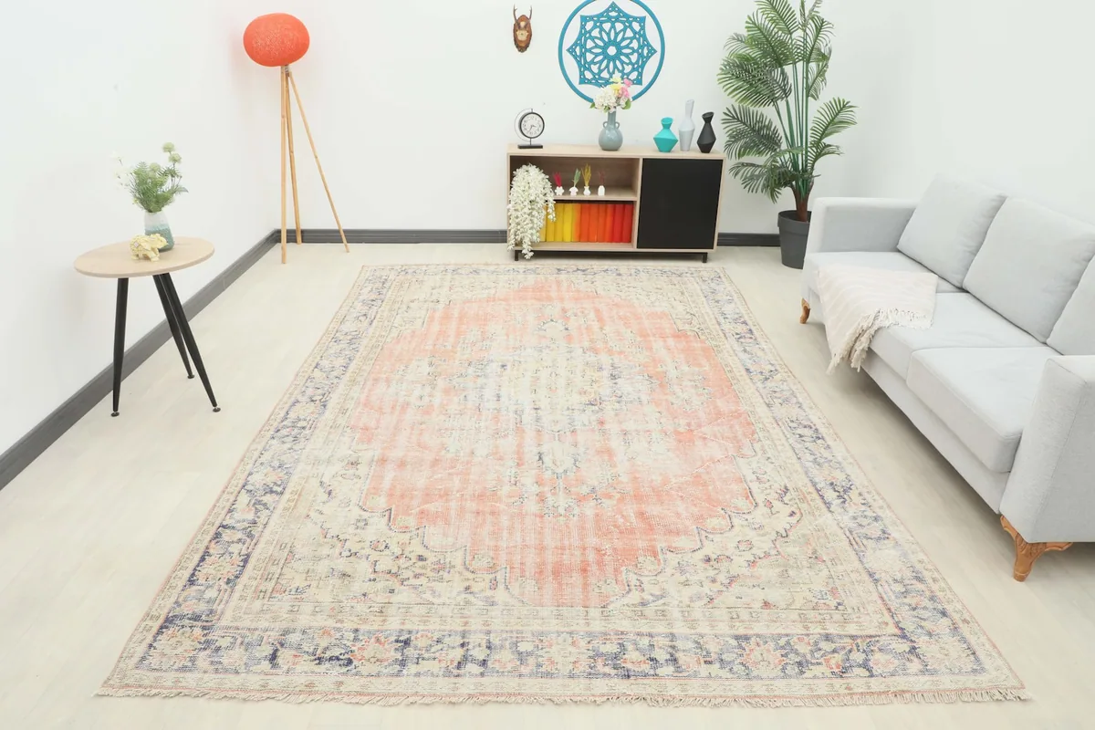 Wide shot of the vintage Anatolian rug furnishing a contemporary living room