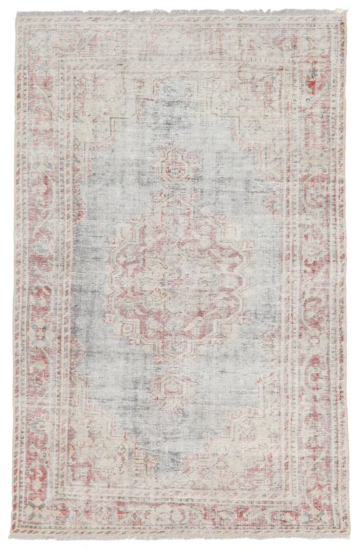 Full top view of the rose and gray Anatolian vintage rug on a white background