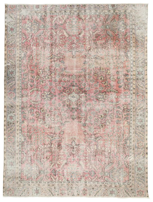 Full overhead view of the rose and gray vintage Anatolian area rug with floral medallion design