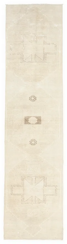 Full overhead view of the beige and tan vintage Anatolian runner rug