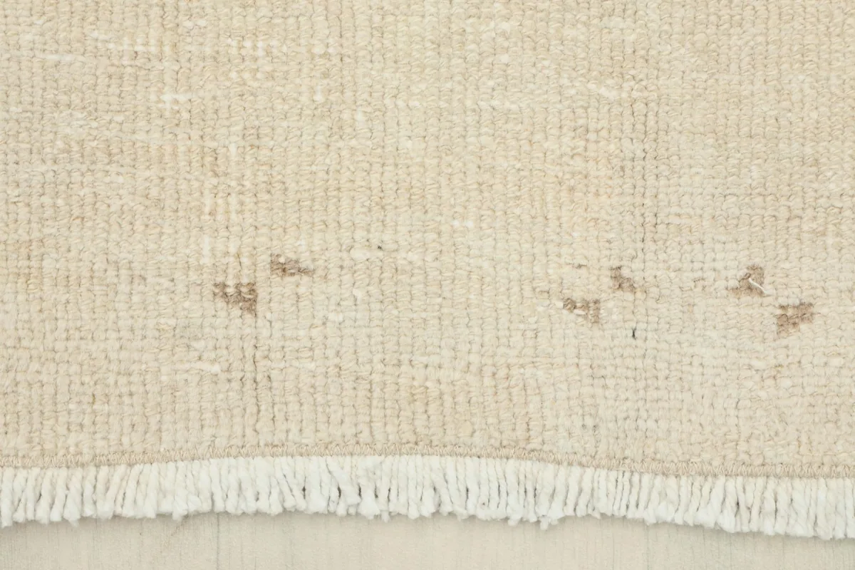 Close-up showing the low wool pile and texture of the vintage runner