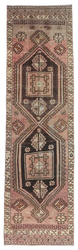 Full overhead view of the 3x11 rose and brown geometric runner rug