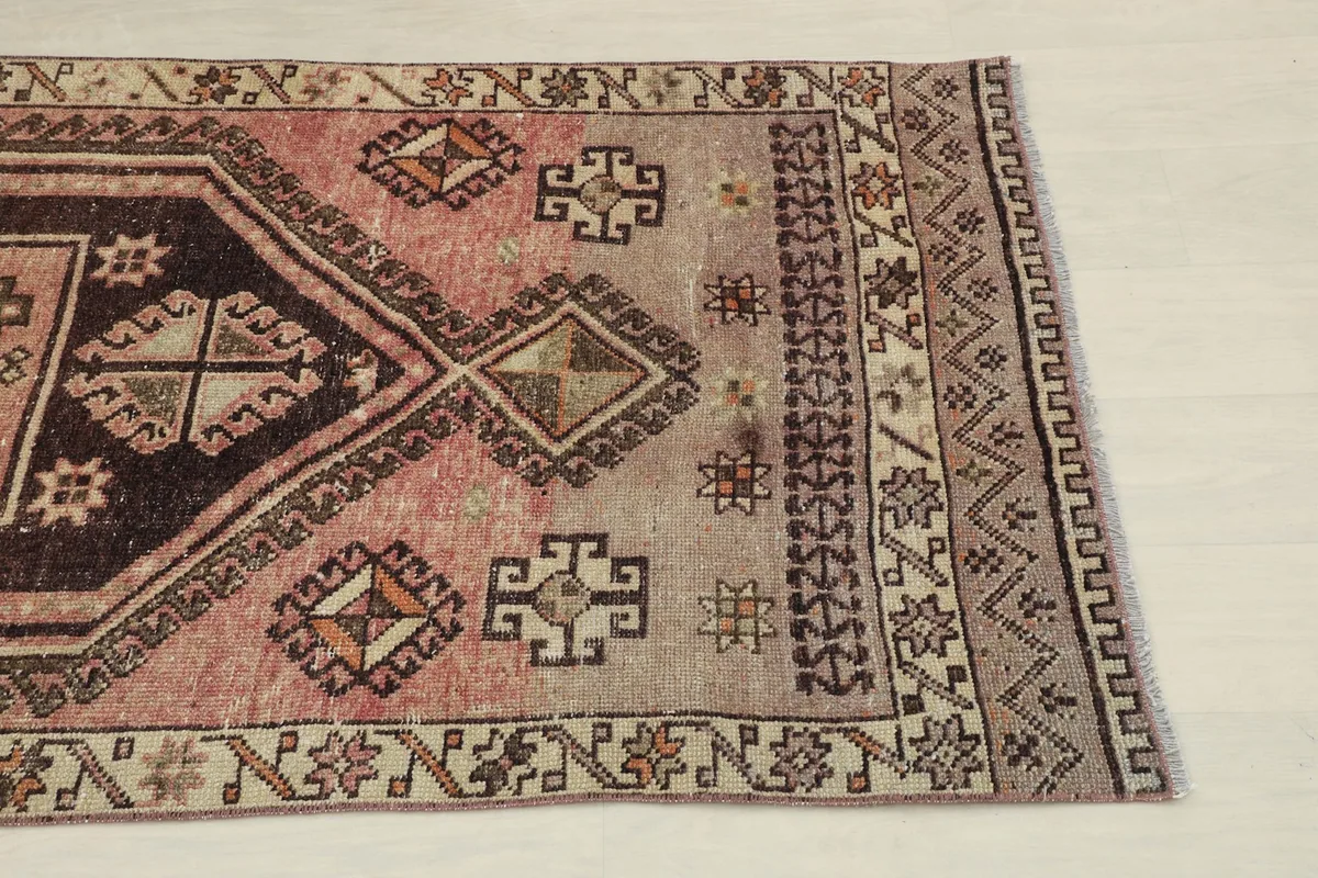 Close-up of the geometric patterns and colors on one end of the runner
