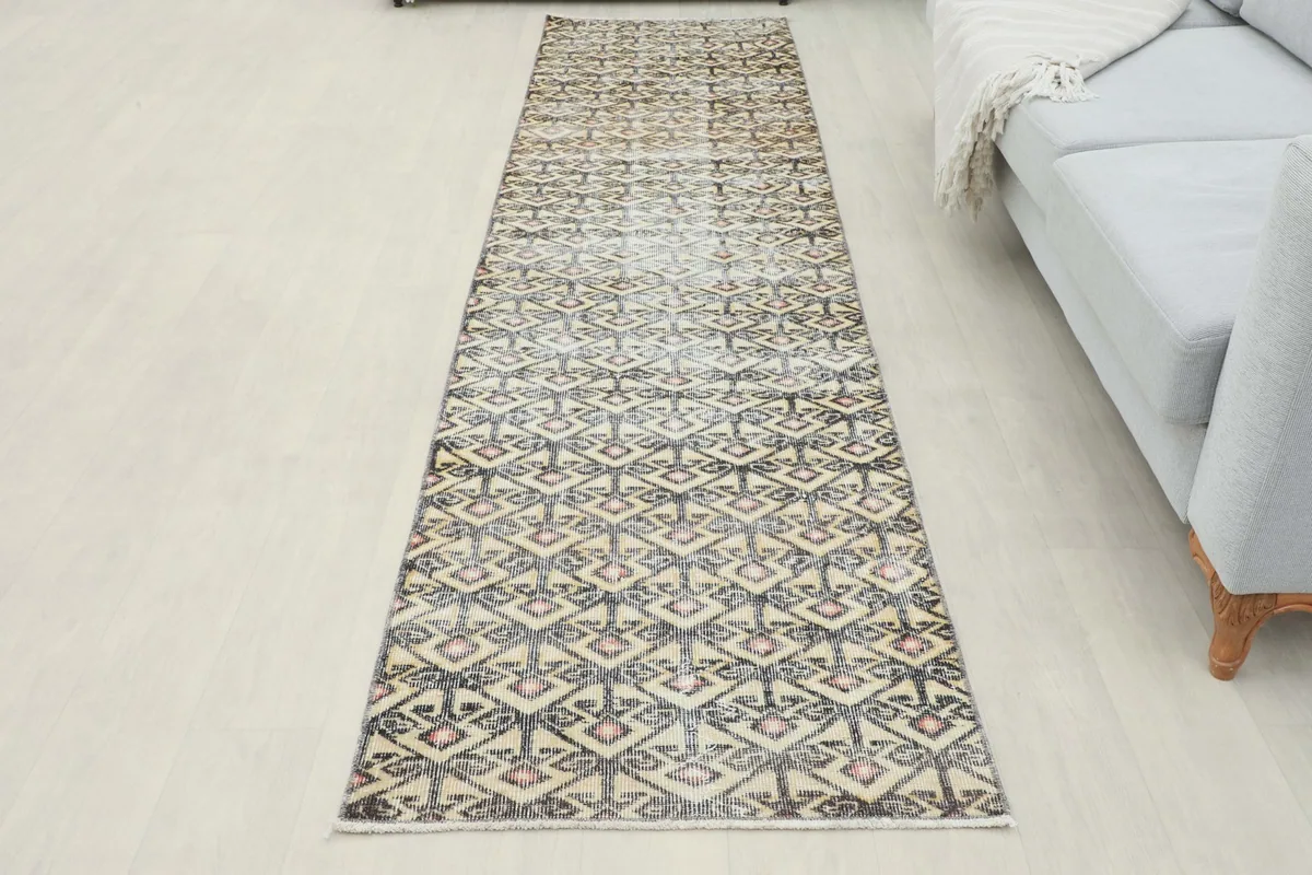 Full view of the runner rug laid out in the room, showcasing its overall appearance